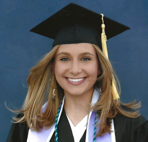 Lindsay Agvent wearing cap and gown headshot